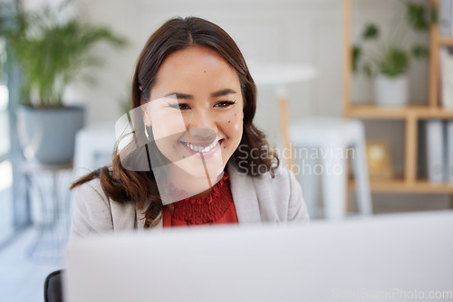 Image of Business, office or happy woman typing on computer working on email or content research project online. Smiling, data feedback or girl journalist writing blog reports or internet articles with focus