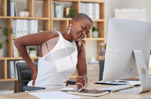 Image of Stress, office or black woman with back pain injury, fatigue or burnout in business or startup company. Posture problems, tired girl or injured female worker frustrated or stressed by muscle tension