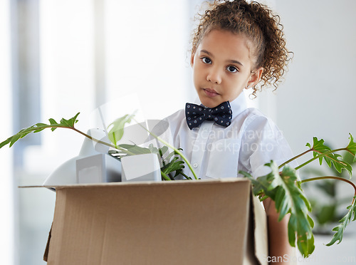 Image of Sad, portrait and a child dressed as a business person with a box of belongings after fired. Unhappy, depressed and a little girl pretending and playing leaving office and packing after retrenchment