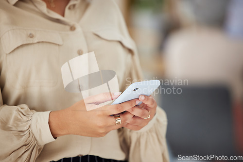 Image of Closeup, woman or hands typing on a phone for social media content internet or website notification. Searching post, digital news blog or person texting on online networking mobile app in office