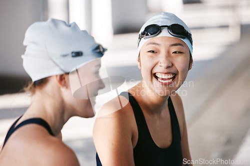 Image of Swimming team, women and happy with sports and fitness, athlete at pool with laughter and fun during training. Female swimmer, friends and trust with happiness, exercise with water sport and workout