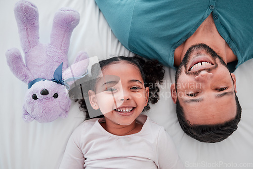 Image of Portrait of dad, child and teddy bear on bed from above, bonding and love with play time to relax. Smile, happiness and man with kid together in bedroom of family home in morning or bedtime in Mexico