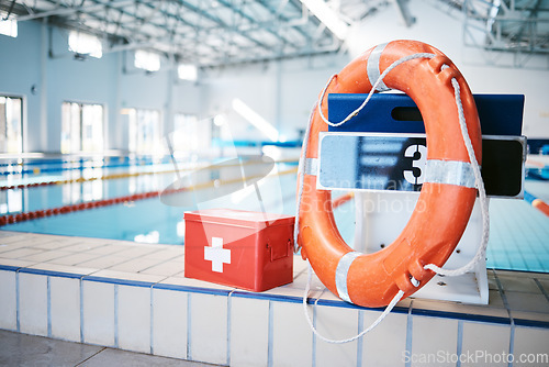 Image of First aid, swimming pool and sports with health and medical equipment, help and safety with buoy and box for emergency. Fitness, safety with kit for protection and healthcare during water sport