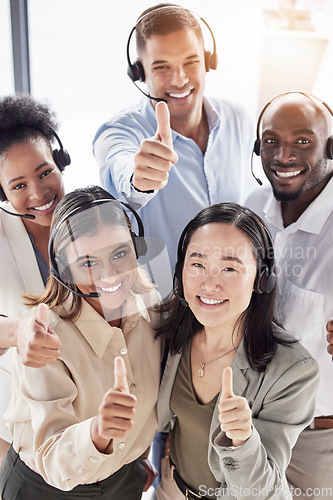 Image of Portrait, call center and happy business people with thumbs up for achievement, success and celebrate winning goals. Diversity team, telemarketing and thumb emoji for collaboration, support and trust