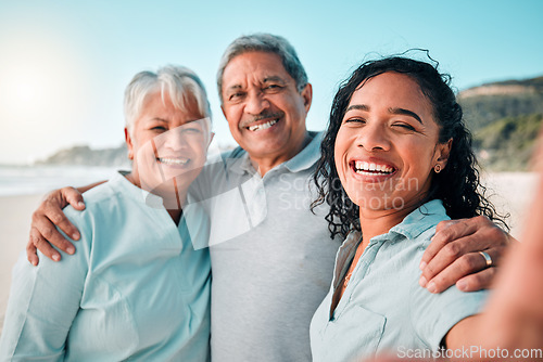 Image of Senior parents, daughter and beach selfie with smile, hug and happiness in summer sunshine for social media. Women, man and portrait with happy, excited face and profile picture with love on holiday