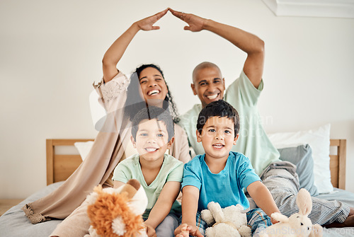 Image of Family home, bedroom and portrait of parents and children bonding on a bed in a house and playing together. Care, mother and father happy and excited with kids in the morning as love and care