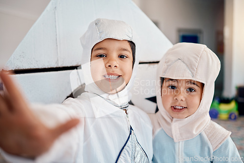 Image of Selfie, costume and playing with children at home for astronaut, halloween and fantasy. Happy, smile and picture with kids in spacesuit in play room for imagination, photography and siblings