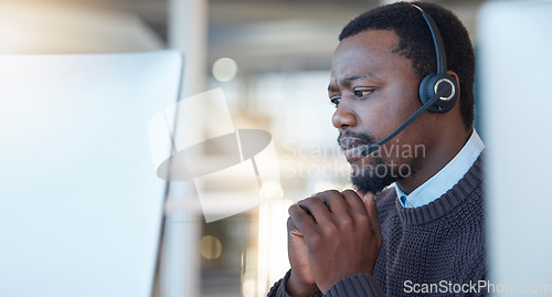 Image of Stress, call center and black man customer service agent with worry, frustration or burnout in office. Nervous, confused and African male telemarketing consultant working on consultation in workplace