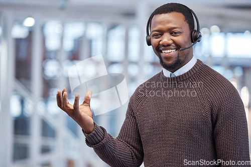 Image of Call Center or black man consultant with empty hand marketing a product, brand and advertising in an office. Portrait, customer service and employee in mockup space for branding a logo in his palm