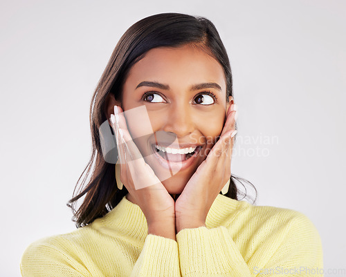 Image of Portrait, smile and woman excited, surprise and cheerful girl isolated on a white studio background. Face, female model and person with facial expression, omg and wow with joy, cheerful and winning