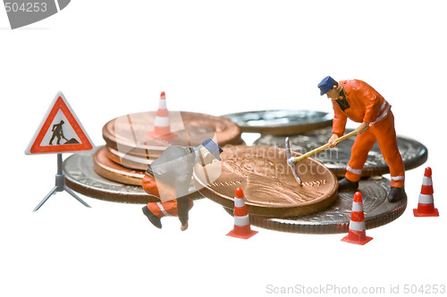 Image of Miniature figures working on a heap of Dollar coins.