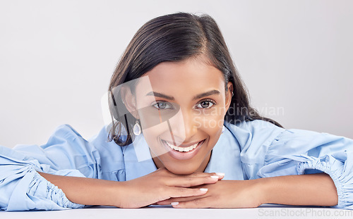 Image of Face, smile and portrait of woman relax feeling happy, confident and excited isolated in a studio white background. Employee, head and Indian female worker proud, happiness and confidence