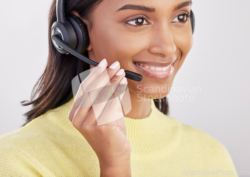 Image of Woman is happy, face with callcenter and headset with mic, CRM and contact us with consultant on studio background. Indian female smile with customer service agent and help desk with tech support