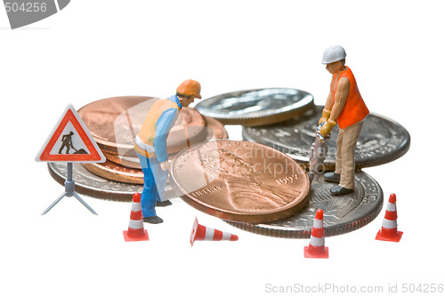 Image of Miniature figures working on a heap of Dollar coins.