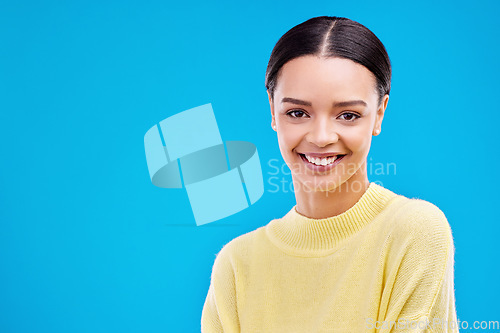 Image of Happy, mockup and portrait of woman in studio for fashion, beauty and natural makeup. Elegant, style and happiness with face of female isolated on blue background for glow, cosmetics and satisfaction