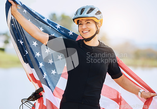 Image of Fitness, American flag and woman with smile, biker and victory with competition, workout and training. Female athlete, happy person and cyclist with symbol for USA, winning and happiness with success