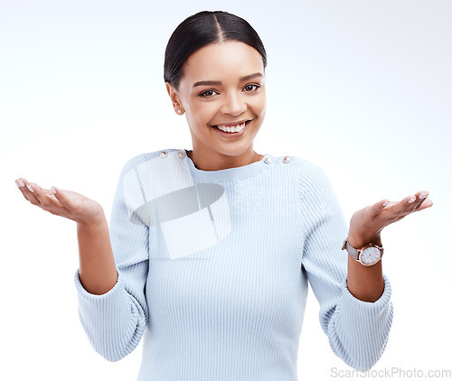 Image of Portrait, smile and woman shrugging in studio for decision, unsure and deciding against white background. Face, emoji and happy female with hands expression for dont know, choice or mockup reaction