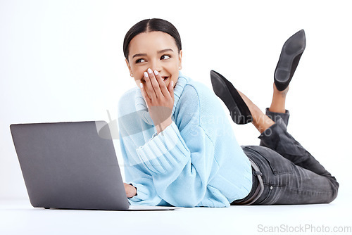 Image of Studio, floor and woman with a laptop, smile and excited girl isolated on a white studio background. Female model, happy or person with device, connection or communication with joy, funny or cheerful