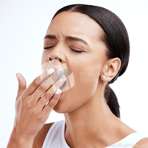 Image of Hand, yawn and tired woman in studio with fatigue, exhaustion and burnout against white background. Yawning, sleepy and girl with insomnia problem, low energy and lazy, bored and emoji while isolated