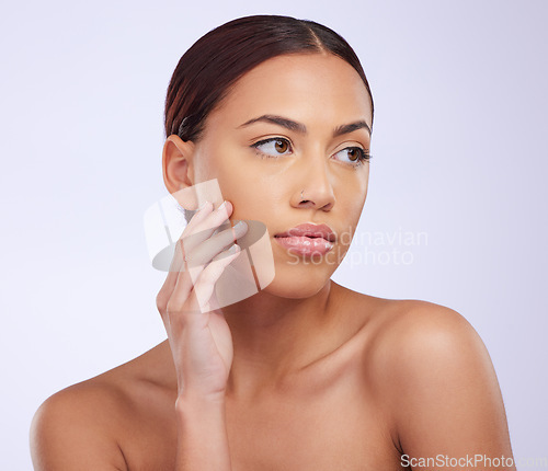 Image of Face, skincare or natural makeup on woman in studio isolated on white background for aesthetic. Facial routine, beauty grooming or hand of girl model relaxing with glow, self love or luxury cosmetics
