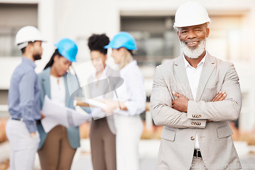 Image of Architecture, construction and portrait of senior black man with team for building site, engineering and planning. Property development, leadership and happy male contractor for city maintenance