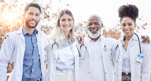 Image of Doctors, hug together and group portrait for motivation, success or team building at hospital. Men, women and teamwork with solidarity, support or diversity in healthcare, goals and friends at clinic