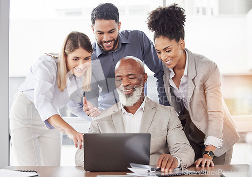 Image of Business people, laptop and meeting in collaboration for teamwork, planning or ideas at the office. Group of employees working on computer together for team project plan or brainstorming at workplace