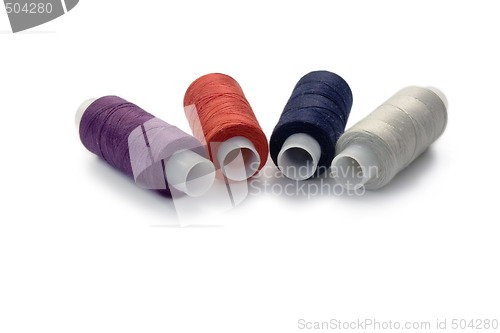 Image of 4 spools of the threads