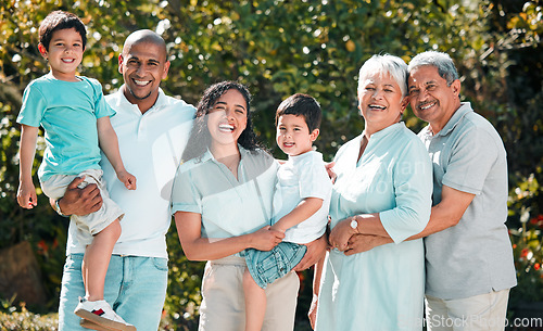 Image of Parents, grandparents and children portrait outdoor as family in backyard with a smile, love and care. Men, women and boy kids together for security, hug and quality time with happiness at park