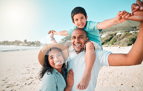 Image of Family, happy and portrait at beach for summer with child, mother and father for fun. Man, woman and boy kid smile for happiness, play and freedom on a holiday with love, adventure and travel outdoor