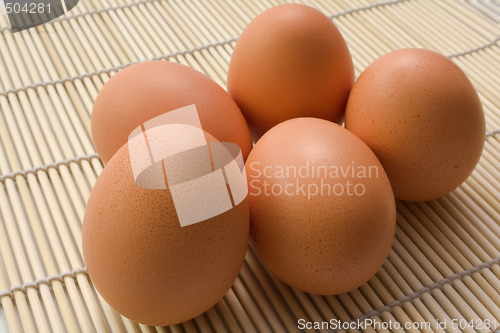 Image of 5 brown eggs