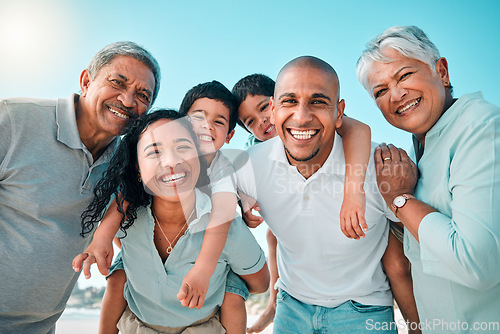 Image of Family, happy and portrait at beach for summer with children, parents and grandparents for fun. Happy men, women and boy kids playing for happiness on a holiday with love, care and support outdoor