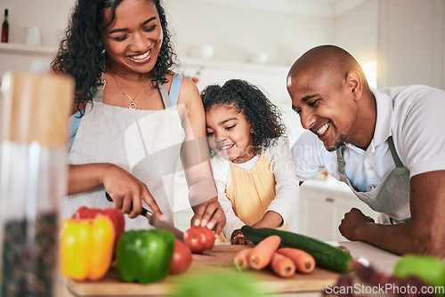 Image of Family, cut and cooking vegetables together or learning chef skill with parents and child in kitchen. Nutrition, healthy food and organic with people teaching and learn to cook at home with bonding