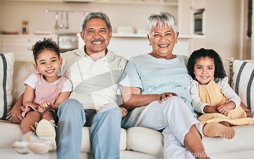 Image of Family in portrait, grandparents and children with smile, relax at home with love and bonding together on sofa. Happiness with people in lounge, relationship and spending quality time on the weekend