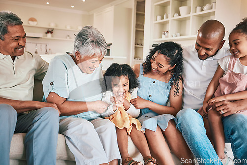 Image of Family, tickle and child with happy people in relax home with love and bonding together on sofa. Happiness, grandparents and parents with kids, generations and relationship with laughter or fun game