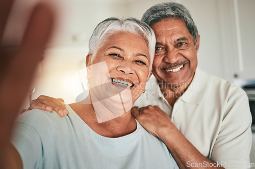 Image of Happy, love and elderly couple smile for selfie, profile picture or photo in living room, cheerful and embrace. Portrait, retirement and excited old people hug enjoy retired lifestyle in their home