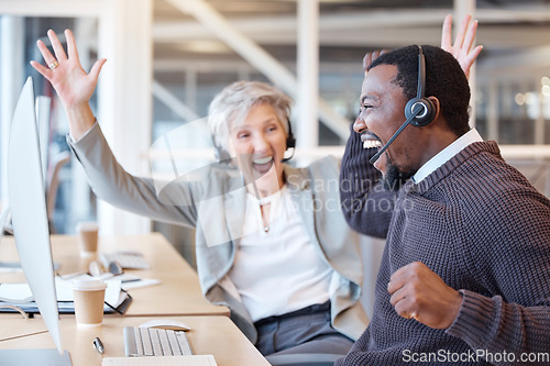 Image of Call center, senior woman and black man with celebration, telemarketing and excited for kpi target. Male consultant, female agent and employees with success, profit goals and cheering with happiness