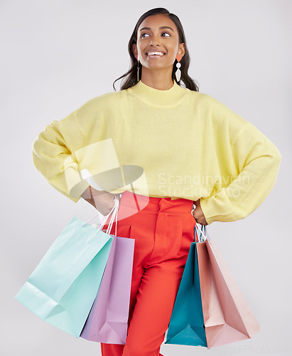 Image of Shopping bags, fashion sale and happy woman in a studio with a customer, gift and sales bag. Isolated, white background and store packaging from a boutique present or mall retail shop with a female