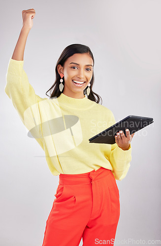 Image of Winner, excited and portrait of woman on tablet for online bonus, winning and wow celebration on white background. Studio, success and girl cheer on digital tech for social media, internet and app