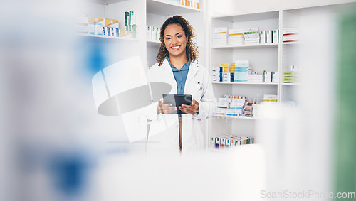 Image of Tablet, pharmacist or portrait of woman in pharmacy with smile in customer services or wellness clinic. Online digital healthcare help, blurry or happy doctor smiling by medication on drugstore