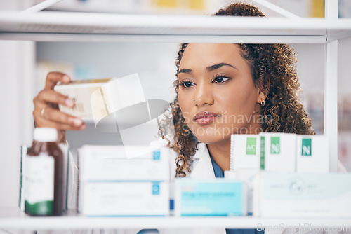 Image of Reading, pharmacy or woman with medicine pills or supplements products to check drugs inventory. Retail store, healthcare clinic or female pharmacist with boxes of medical vitamins or stock on shelf