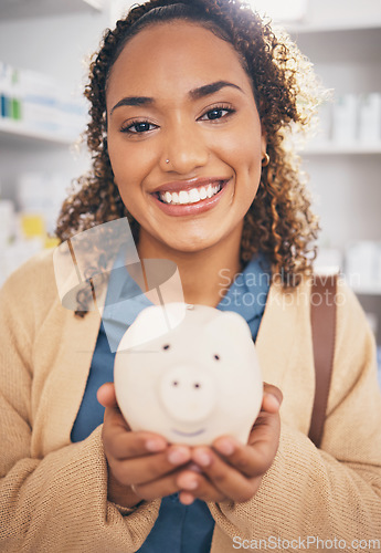 Image of Pharmacy, piggy bank and portrait of woman with smile in clinic for pills, medication and medical products. Healthcare, health insurance and happy female with finance, money and savings for medicine