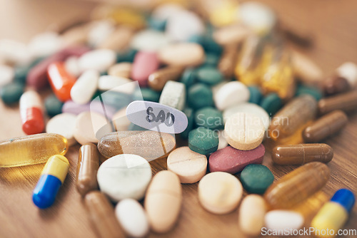 Image of Healthcare, depression or table with medicine pills or supplements products at drugstore clinic. Pharmaceuticals background, blur or medical vitamins, stress anxiety tablets or sad medication closeup