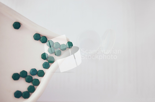 Image of Medicine, container or organize pills for medical correct dose, inventory or pharmaceutical management. Closeup of healthcare tablets, pharmacy products background or retail store drugs distribution