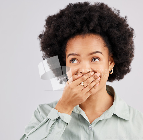 Image of Thinking, surprise and black woman with a hand on her mouth, shocked and omg against a grey studio background. Female, afro and person cover lips, wtf and facial expression for news and announcement