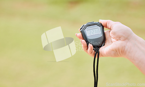 Image of Hand, stopwatch and mockup with a personal trainer outdoor for sports, fitness or training for a time trial. Exercise, watch and workout with a coach timing an athlete outside for cardio or endurance