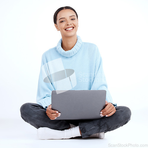 Image of College woman, portrait and laptop in a studio with happiness from student work. Isolated, white background and happy female working on a computer ready for studying and web learning on ground