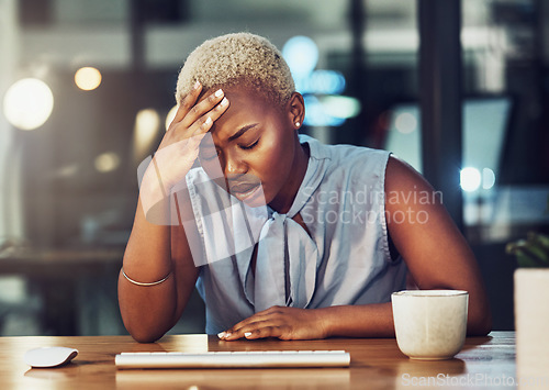 Image of Mental health, office and black woman with night stress, depression or burnout from overtime work. Tired, migraine and frustrated business person, sad consultant or depressed agent with pain problem