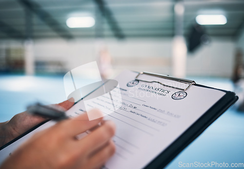 Image of Hand, documents and contract in gym with a coach watching a performance for membership sign up or checklist. Paper, assessment and personal trainer in a sports center for fitness, planning or review