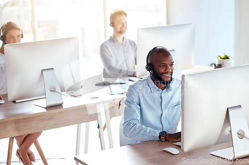 Image of Call center, computer and consulting with black man in office for customer service, technical support and advice. Technology, contact us and communication with employee operator in help desk agency